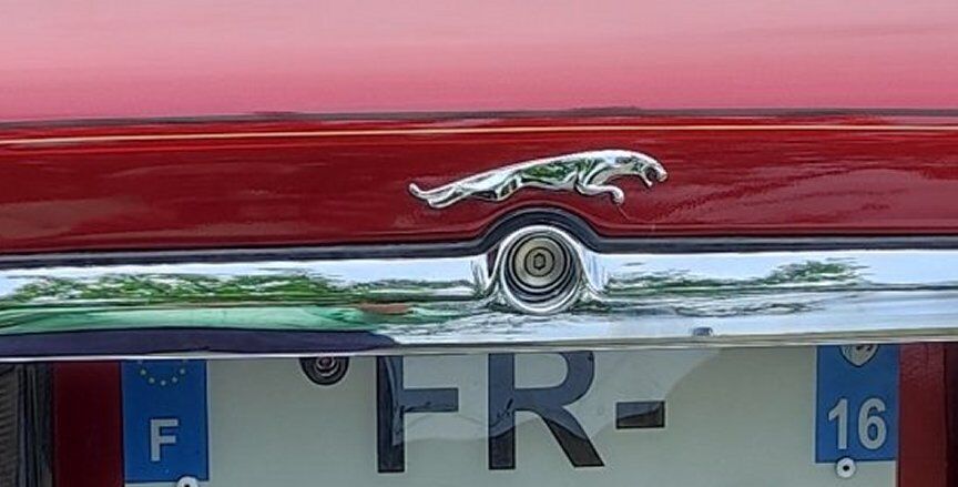 Small reversing camera fitted above the rear registration plate
