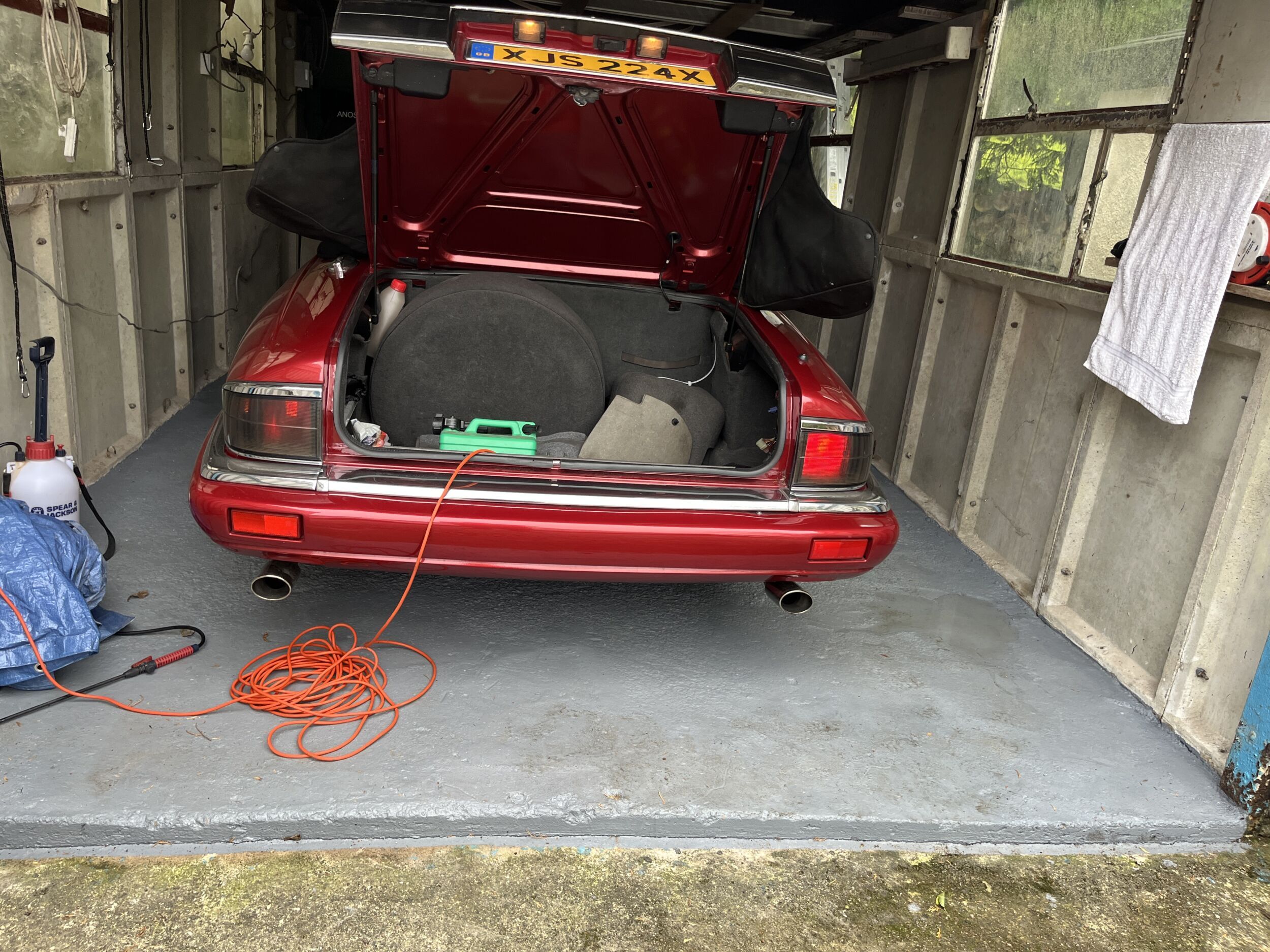 Rear of red XJS Facelift Convertible: original tail lamp on the left and brighter red LED on the right